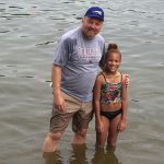 BAPTISMAL SERVICE CROSSES CHURCH LINES