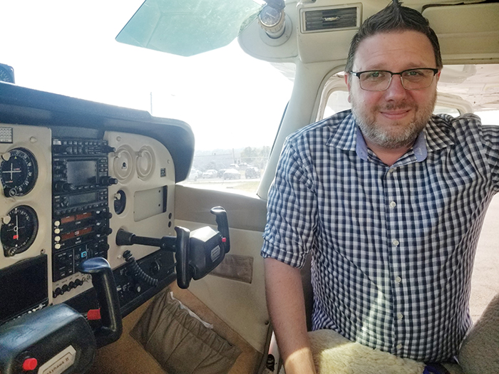 PILOT HELPS PREPARE MISSIONARIES FOR TAKE OFF - Baptist & Reflector