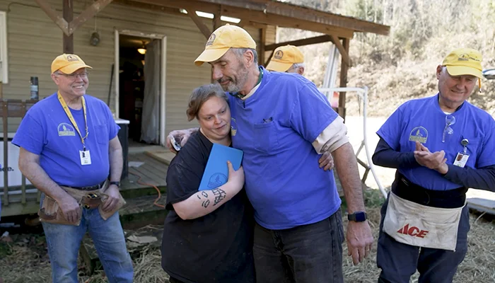 250923 Helene Gallery - 2 Big ol DR hug and bible